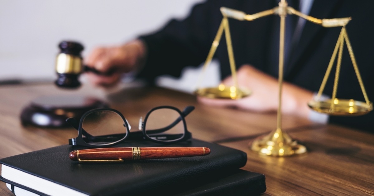 Judge with Gavel- Book, Pen, Glasses & Scale on Table