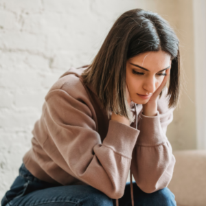 Frustrated person at desk regretting a legal mistake