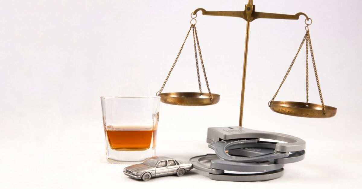 Alcohol and Handcuffs - DUI Laws in Utah - Wasatch Defense Lawyers