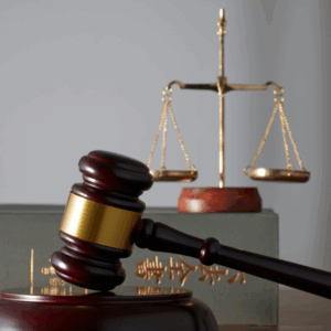 Gavel and justice scales symbolizing Utah weapons rights in violent crime cases