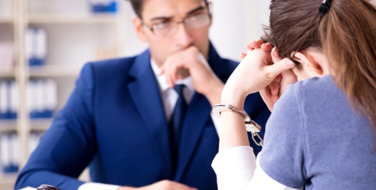 Criminal defense lawyer in Utah meeting with client